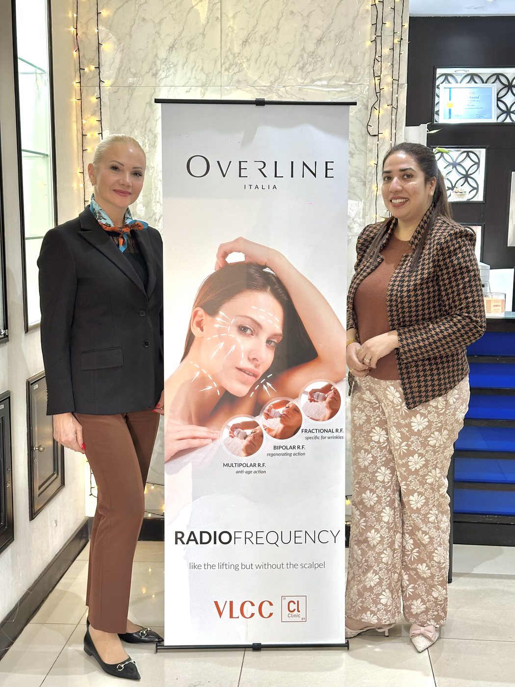 With clinic partners beside an Overline radiofrequency display